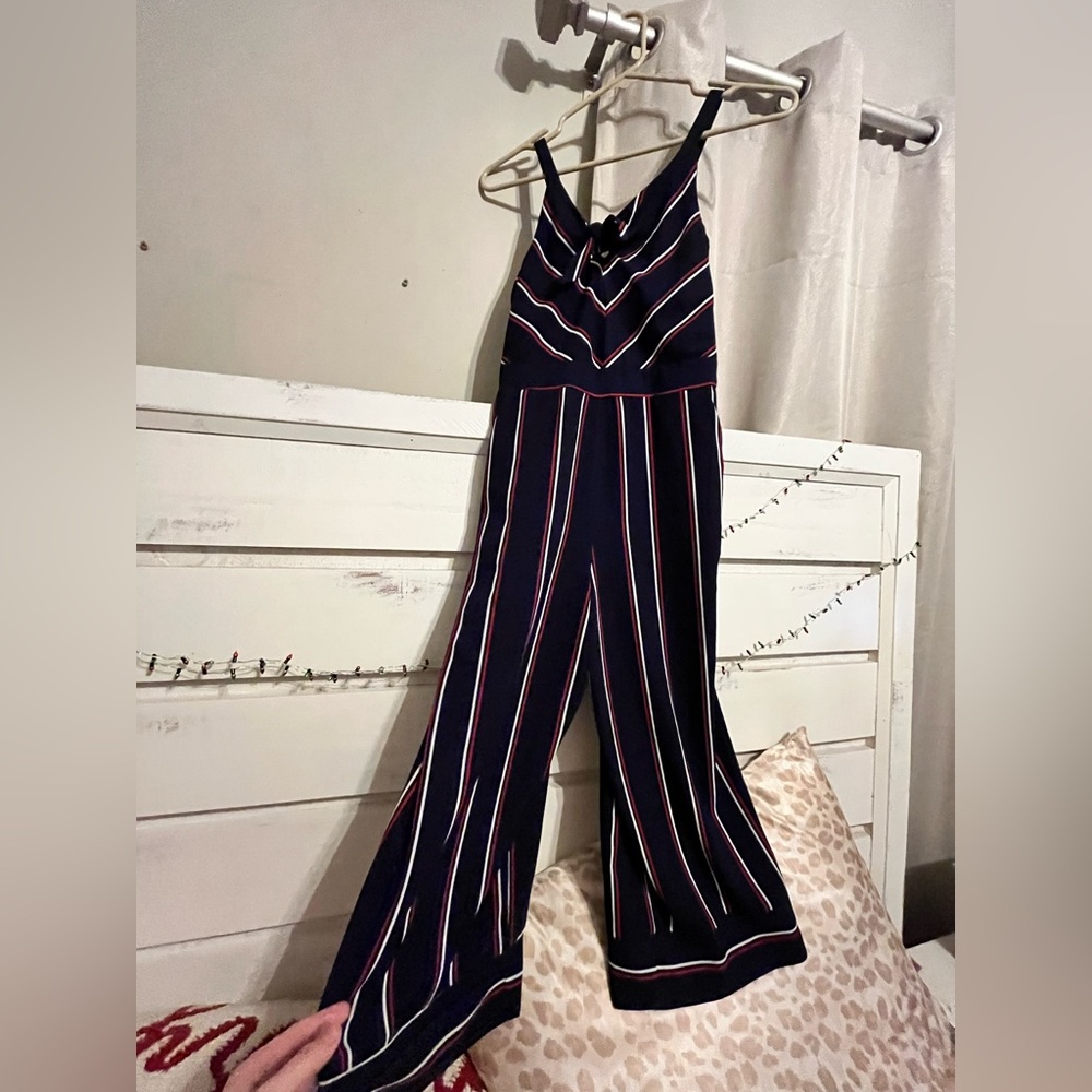 Wide pant leg jumpsuit, cute on but no longer fits.